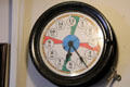 Radio room clock shows red silent times used to listen for distress signals on USS Potomac. Oakland, CA.