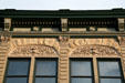 Roofline details of Sternberg-Citizens National Bank Building on Pearl Street Mall. Boulder, CO.