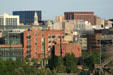 Skyline of Denver around Convention Center galleria. Denver, CO.