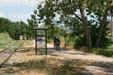 Tourist streetcar runs along Platte River recreational corridor. Denver, CO.