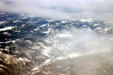 Mist-covered Rocky Mountains from air. CO.