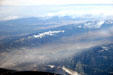 Rugged peaks of chain in Rocky Mountains from air. CO.