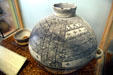 Pueblo pottery corn storage jar with bowl used a protective lid found buried with corn inside at Mesa Verde Museum. CO.