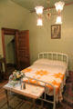 Servant's room with quilt at Rosemount House Museum. Pueblo, CO.