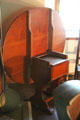Hutch table from New York served as table, seat & storage box depending on how folded at Henry Whitfield State Museum. Guilford, CT.