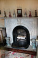 Fireplace in Mary Sheldon's room at Butler-McCook House Museum. Hartford, CT.