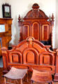 Massive carved bedstead in second guest bedroom at Isham-Terry House Museum. Hartford, CT
