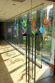 Glass corridor between buildings New Britain Museum of American Art with colored glass sculptures. New Britain, CT.