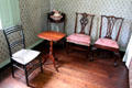 Chairs, candle table & washstand in bedroom at Oliver Ellsworth Homestead Museum. Windsor, CT.