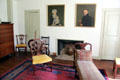 Parlor room with portraits chaise lounge at Oliver Ellsworth Homestead Museum. Windsor, CT.
