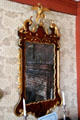 Early American wooden mirror frame with eagle carving at Denison Homestead Museum. Stonington, CT.