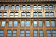 Commercial skyscraper with terra cotta lions. Washington, DC.