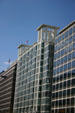 Modern glass curtain walls on Pennsylvania Ave. west of 18th St. NW. Washington, DC.