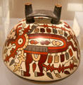 Nazca ceramic double-spout-&-bridge bottle painted with fearsome creature from Peru at Dumbarton Oaks Museum. Washington, DC.