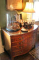 Chest of drawers with antique objects at Tudor Place. Washington, DC.