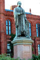 Statue of Joseph Henry first Secretary of Smithsonian Institution at Smithsonian Castle. Washington, DC.