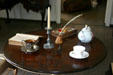 Table with early American objects in The Oldest House. St Augustine, FL.