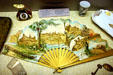 Paper fan of Florida hotels & other Florida souvenirs in museum of The Oldest House. St Augustine, FL.