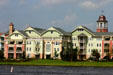 Fanciful residential buildings across Village Lake from Downtown Disney. Disney World, FL.
