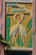 Art Deco relief detail of two flamingos on Ocean Five Hotel. Miami Beach, FL.
