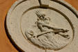 Medallion with Neptune on 501 Collins Av. Miami Beach, FL.