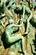 Man reaches back to save woman at Holocaust Memorial. Miami Beach, FL.
