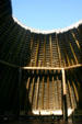 Interior log supports of native council house shelter at San Luis Historic Site. Tallahassee, FL.