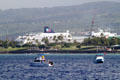 Cruise ships against hills of Honolulu. Honolulu, HI.
