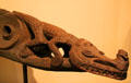 Carved wood slit gong drum in shape of crocodile by latmul people from Sepik River region of Papua New Guinea at Honolulu Academy of Arts. Honolulu, HI.