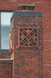 Vent stack with grill on People's Savings Bank. Cedar Rapids, IA.