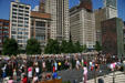 Buildings of Michigan Avenue over Crown Fountain of Millennium Park. Chicago, IL.