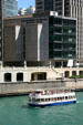 University of Chicago Gleacher Center above Chicago River. Chicago, IL.