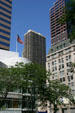 Black & white Huron Plaza framed by buildings on Michigan Av. Chicago, IL.