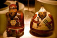 Nazca pottery vessels depicting warriors from Peru with one having trophy head at Art Institute of Chicago. Chicago, IL.