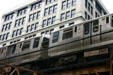 CTA transit train on elevated loop. Chicago, IL.