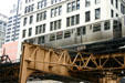Elevated loop cast iron track sections over streets of Chicago. Chicago, IL.