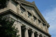 Pediment detail of Museum of Science & Industry, for which original plaster exterior was replicated in stone. Chicago, IL.