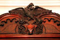 Carved eagle atop Benjamin Harrison bookcase at Benjamin Harrison Presidential Site. Indianapolis, IN.