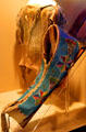Plains Indian boy's elk skin shirt & Kiowa beaded cradleboard at Sedgwick County Historical Museum. Wichita, KS.