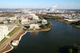 Louisiana State Capitol Park on Capitol Lake with chemical plants beyond. Baton Rouge, LA