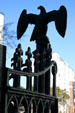 Cast iron eagle on main gateway of Old State Capitol fence. Baton Rouge, LA.