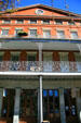 Entrance of 1850 House in Lower Pontalba Building on Jackson Square. New Orleans, LA