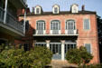Citrus trees in courtyard at rears of Hermann Grima House. New Orleans, LA.