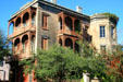 Corner mansion with elaborate ironwork at Esplanade Ave. & Bourbon St. New Orleans, LA