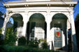 Shotgun house with arched porch columns in Garden District. New Orleans, LA.