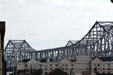 Crescent City Connection Bridge seen above New Orleans buildings. New Orleans, LA.