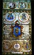 Stained glass window tracing history of seals of the state of Massachusetts in State House. Boston, MA.