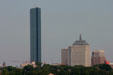 Skyline with John Hancock Tower & John Hancock Building with spire by Cram & Ferguson & arched 25 floor 500 Boylston St. between. Boston, MA.