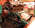 Revolving-flat carding machine made in Lowell at Boott Cotton Mills. Lowell, MA.