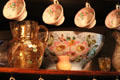 Yellow glass pitcher with fish pattern & serving bowl at Fall River Historical Society Museum. Fall River, MA.
